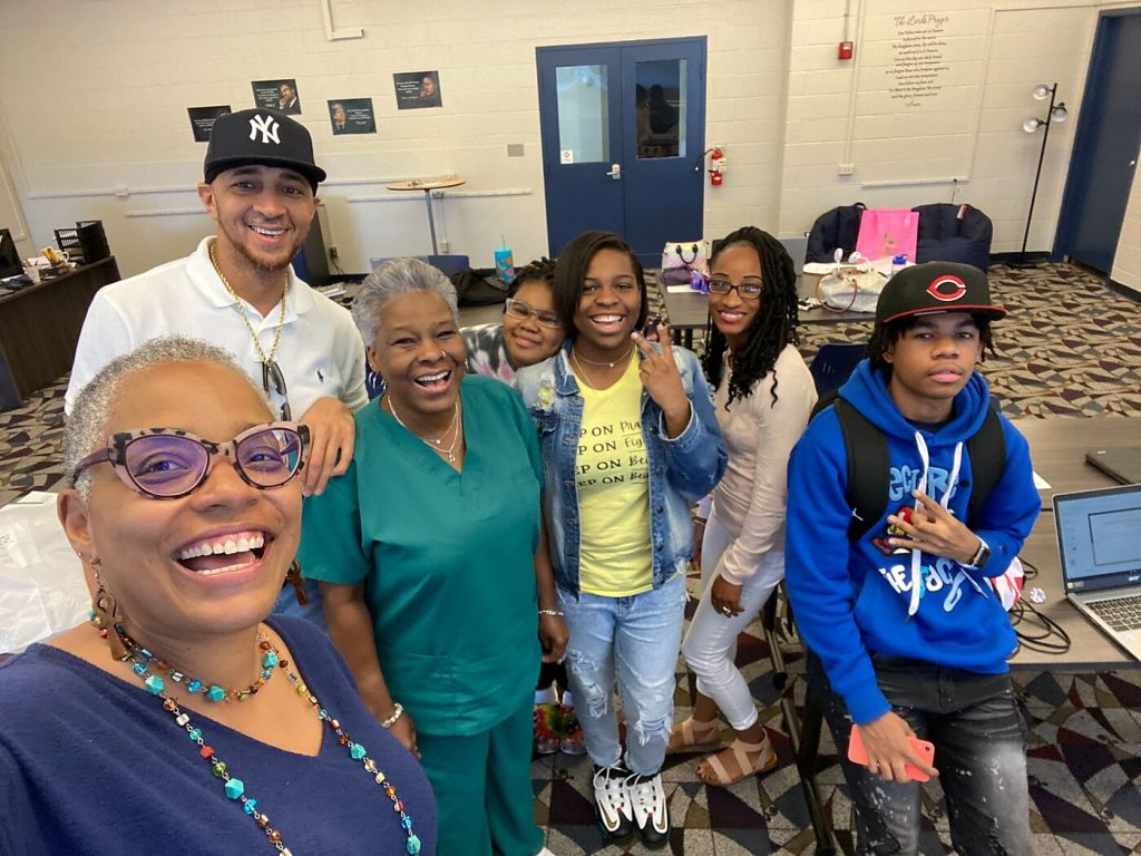 photo of staff members from The CATO Institute engaging with students at Fred L. Shuttlesworth Christian Academy